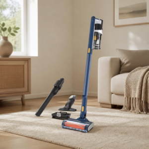 Shark cordless lightweight vacuum cleaner being used on a clean hard floor in a bright, neutral home.