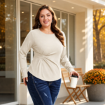 Woman wearing a ruched-waist long-sleeve top with jeans in a casual fall outfit