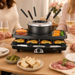 Electric raclette grill with fondue pot set up for a cozy dinner gathering