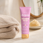 Jergens body lotion beside a towel in a simple body-care setting