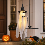 Large Halloween ghost decoration styled near a front porch