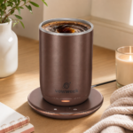 Self-stirring heated coffee mug used in a cozy desk coffee setup